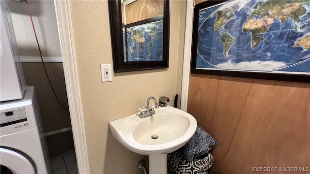 2096 Birchwood Ln, Osage Beach, MO 65065 - bathroom with washer / dryer and a textured wall