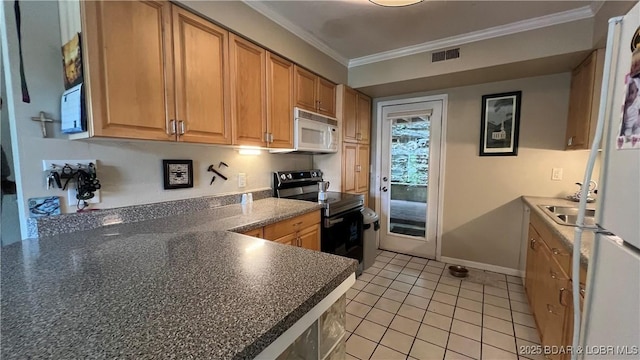 2096 Birchwood Ln, Osage Beach, MO 65065 - kitchen featuring stainless steel range with electric cooktop, white microwave, ornamental molding, light tile patterned flooring, and dark countertops