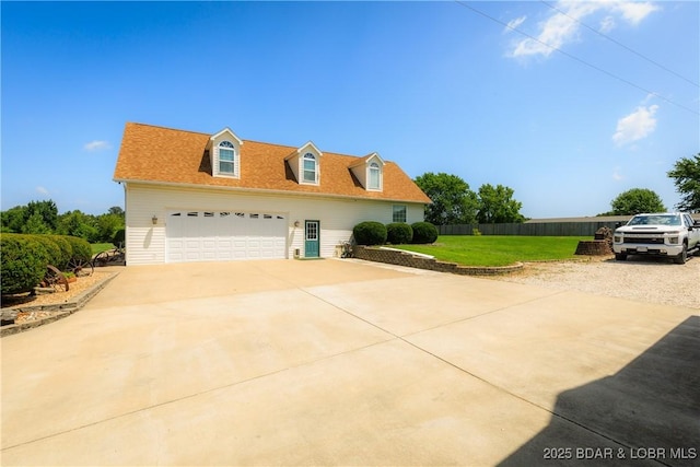2174 State Road V, Linn Creek, MO 65052 - view of front of home featuring concrete driveway and a garage