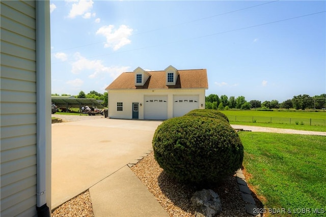 2174 State Road V, Linn Creek, MO 65052 - view of side of property with a view of rural / pastoral area and a garage