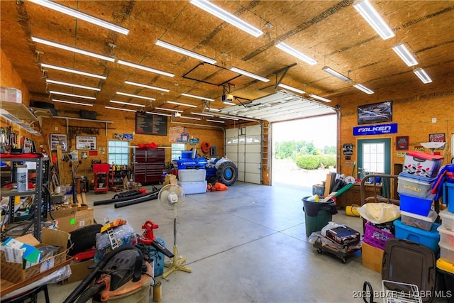 2174 State Road V, Linn Creek, MO 65052 - garage featuring a garage door opener