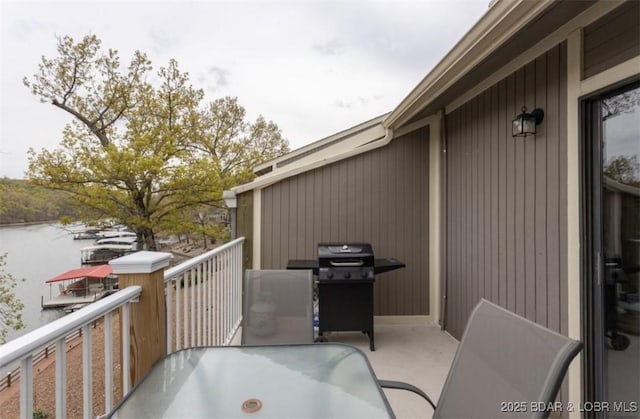 611 Lazy Days Rd Unit B11, Osage Beach, MO 65065 - patio / terrace featuring outdoor dining area and a grill