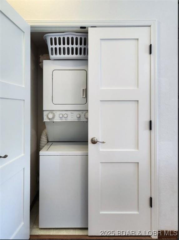 611 Lazy Days Rd Unit B11, Osage Beach, MO 65065 - washroom featuring stacked washer / dryer