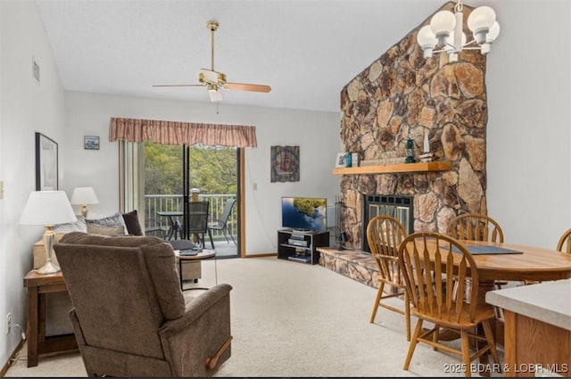 611 Lazy Days Rd Unit B11, Osage Beach, MO 65065 - living room with a ceiling fan, a fireplace, light colored carpet, and a chandelier