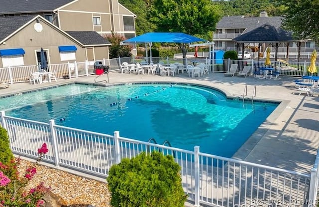611 Lazy Days Rd Unit B11, Osage Beach, MO 65065 - community pool featuring a gazebo and a patio