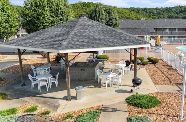 611 Lazy Days Rd Unit B11, Osage Beach, MO 65065 - fenced backyard with a gazebo, outdoor dining area, and a patio area