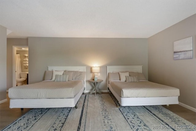 392 Hopetown Dr, Osage Beach, MO 65065 - bedroom featuring baseboards and wood finished floors