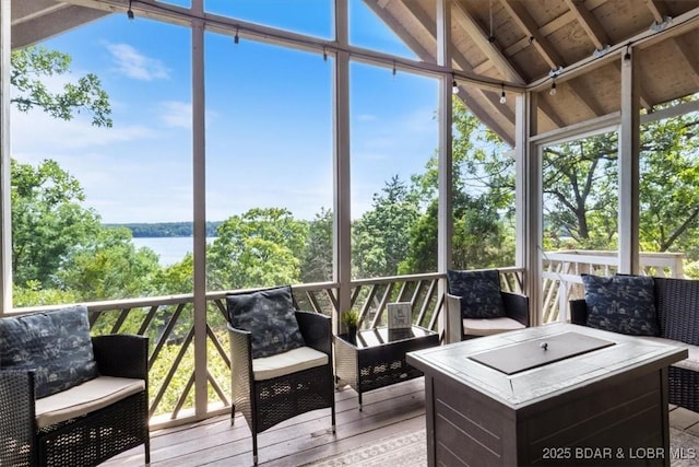 392 Hopetown Dr, Osage Beach, MO 65065 - sunroom / solarium featuring a water view, outdoor lounge area, and vaulted ceiling