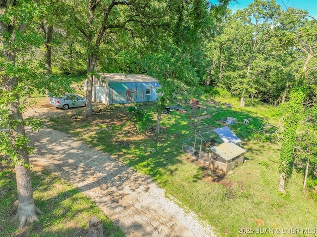 1727 Bollinger Creek Rd, Climax Springs, MO 65324 - view of yard with dirt driveway and an outbuilding