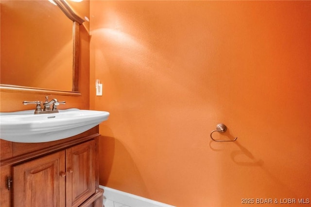 22 Hand Ln, Eldon, MO 65026 - bathroom with vanity and baseboards