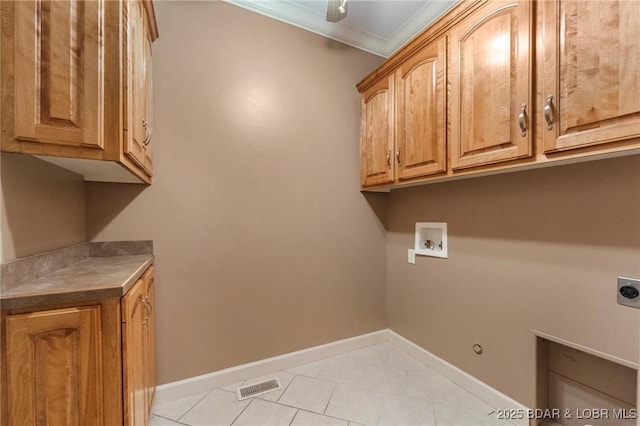 22 Hand Ln, Eldon, MO 65026 - laundry area with cabinet space, electric dryer hookup, washer hookup, hookup for a gas dryer, and ornamental molding