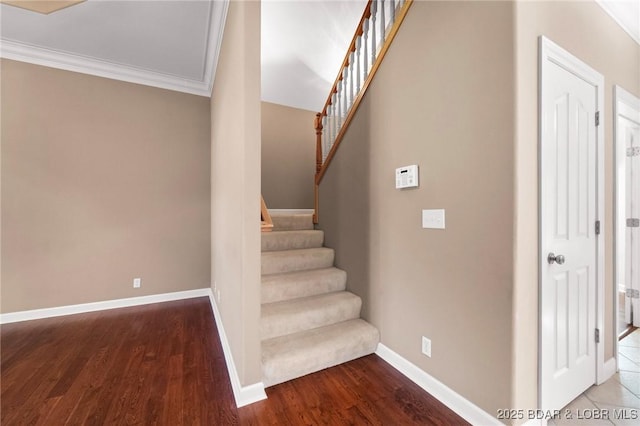 22 Hand Ln, Eldon, MO 65026 - stairs with wood finished floors and ornamental molding