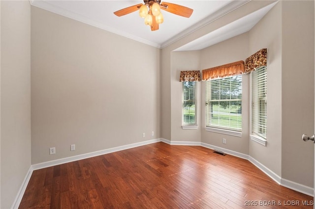 22 Hand Ln, Eldon, MO 65026 - empty room with crown molding, wood finished floors, and a ceiling fan