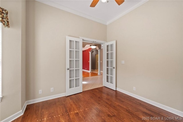22 Hand Ln, Eldon, MO 65026 - unfurnished room with french doors, a ceiling fan, crown molding, and wood finished floors