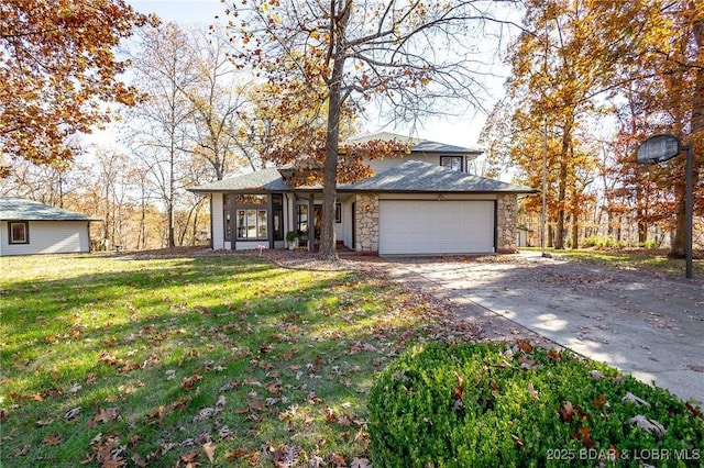 170 Twin Oaks Dr, Lake Ozark, MO 65049 - view of front of property featuring driveway, a front lawn, an attached garage, and stone siding