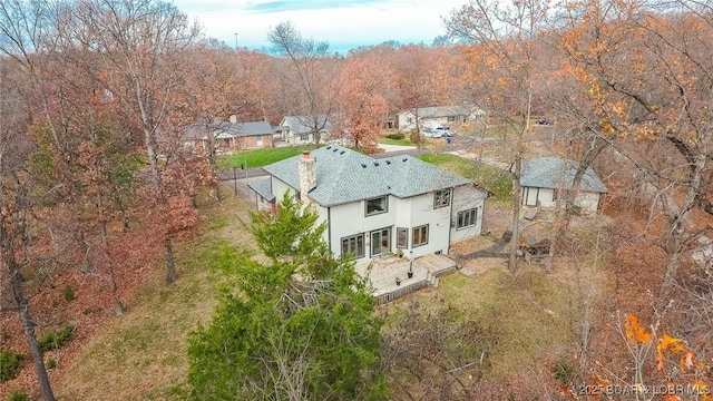170 Twin Oaks Dr, Lake Ozark, MO 65049 - aerial view of property and surrounding area featuring a heavily wooded area