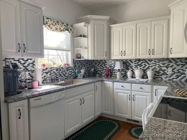 130 Guinevere Ct, Camdenton, MO 65020 - kitchen with dishwasher, white cabinetry, decorative backsplash, and dark wood-style floors