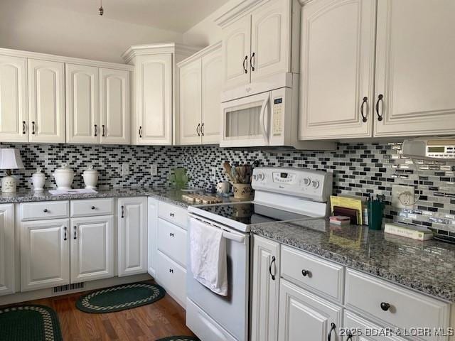 130 Guinevere Ct, Camdenton, MO 65020 - kitchen featuring white appliances, backsplash, white cabinets, dark stone countertops, and dark wood finished floors