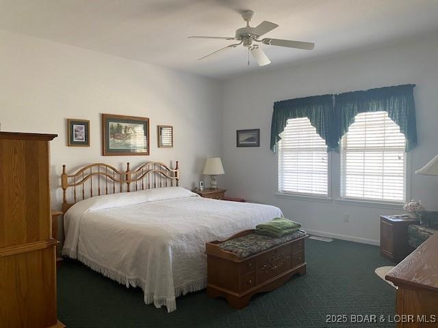130 Guinevere Ct, Camdenton, MO 65020 - carpeted bedroom featuring baseboards and ceiling fan