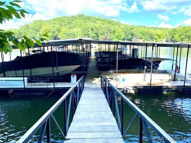 130 Guinevere Ct, Camdenton, MO 65020 - dock area featuring a water view