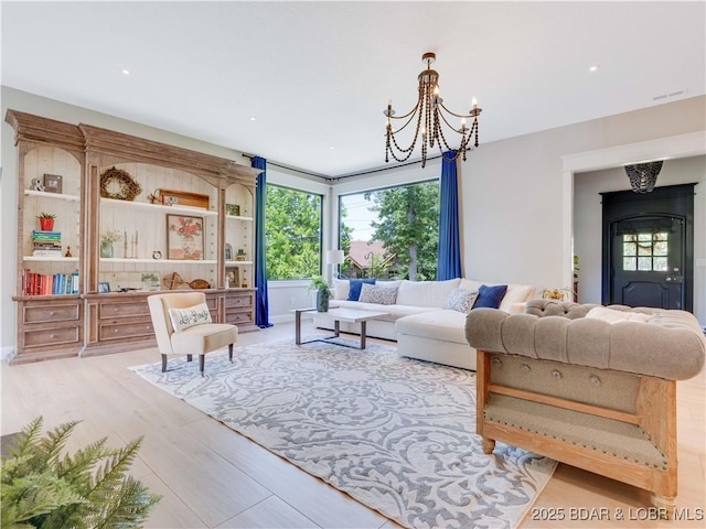 92 Arrowhead Beach Rd, Lake Ozark, MO 65049 - living area featuring a chandelier, wood finished floors, and recessed lighting