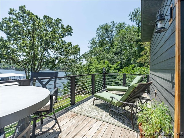 92 Arrowhead Beach Rd, Lake Ozark, MO 65049 - wooden deck featuring outdoor dining area