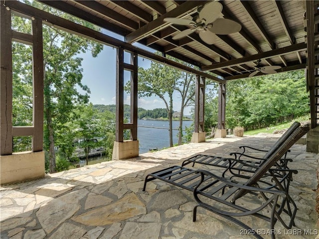 92 Arrowhead Beach Rd, Lake Ozark, MO 65049 - view of patio featuring a ceiling fan, a water view, and view of wooded area