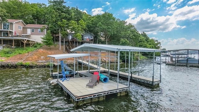 35 Port Bagnell W, Eldon, MO 65026 - dock area featuring a water view and boat lift