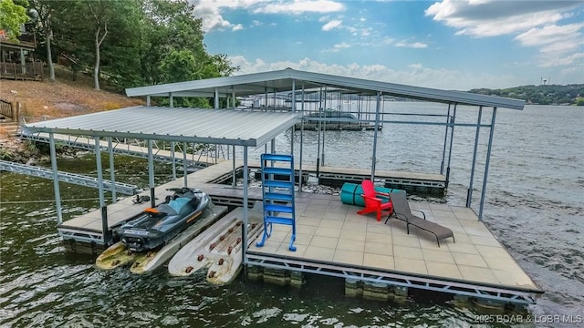 35 Port Bagnell W, Eldon, MO 65026 - dock area featuring a water view and boat lift