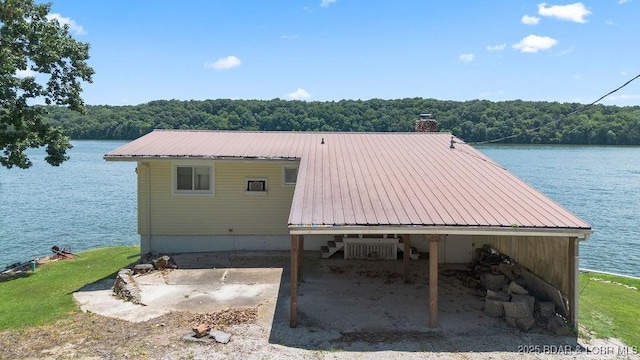27527 Clyne Dr, Barnett, MO 65011 - exterior space featuring a forest view and a water view