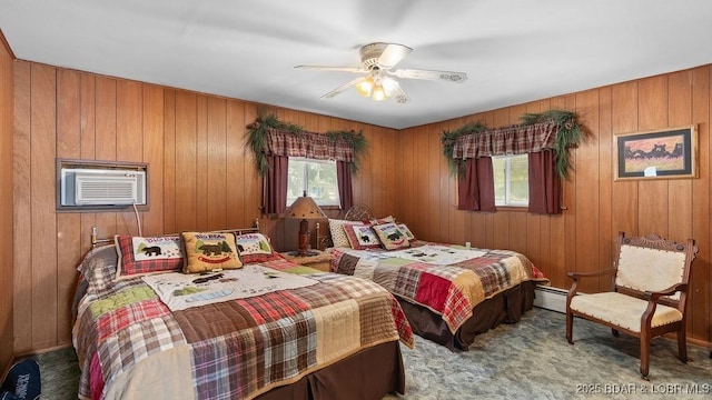 27527 Clyne Dr, Barnett, MO 65011 - bedroom featuring a baseboard radiator, carpet, a wall mounted AC, wood walls, and a ceiling fan