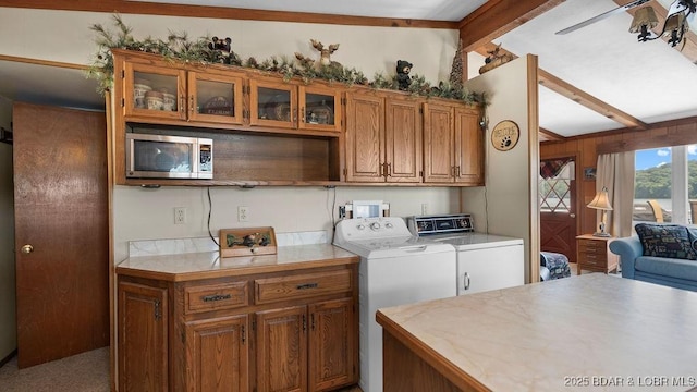 27527 Clyne Dr, Barnett, MO 65011 - washroom with cabinet space and independent washer and dryer