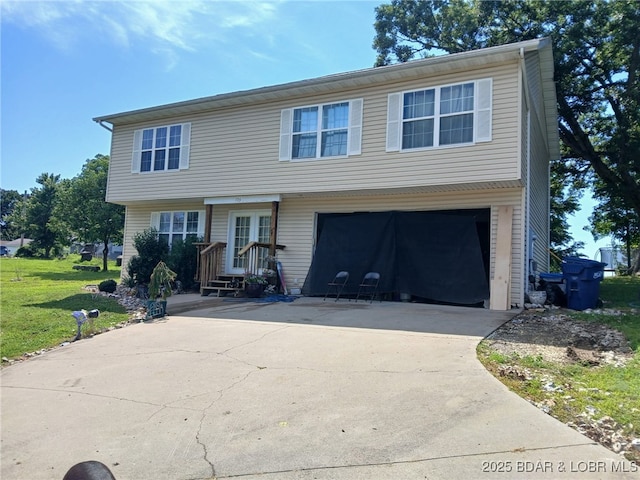 133 Ha Ha Tonka Rd, Camdenton, MO 65020 - colonial home with a garage, driveway, a front yard, and french doors