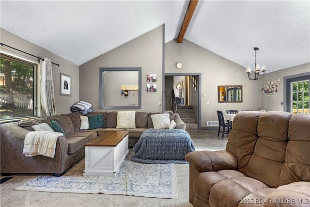 4741 Clearwood Ln, Osage Beach, MO 65065 - living area featuring a chandelier, stairway, and wood finished floors
