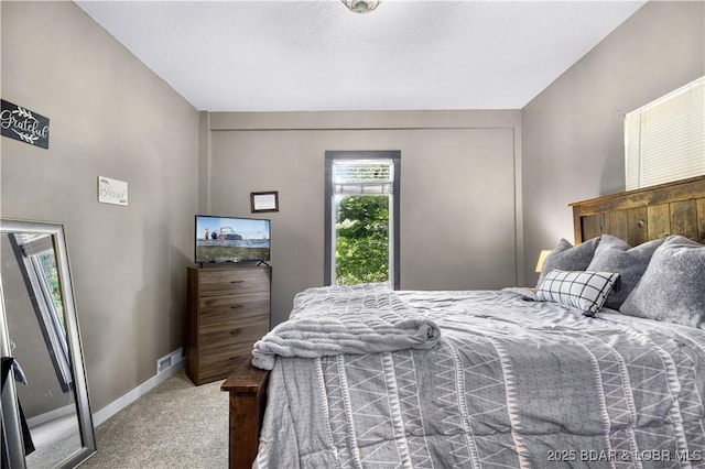 4741 Clearwood Ln, Osage Beach, MO 65065 - carpeted bedroom with baseboards