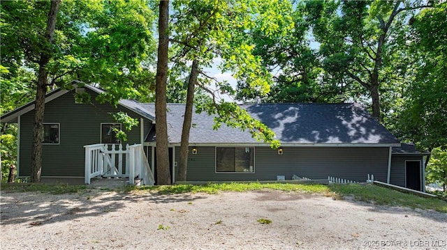 4741 Clearwood Ln, Osage Beach, MO 65065 - back of house with roof with shingles