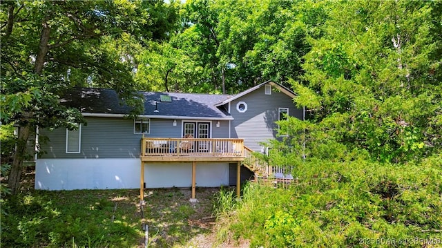 4741 Clearwood Ln, Osage Beach, MO 65065 - back of house with a deck and roof with shingles