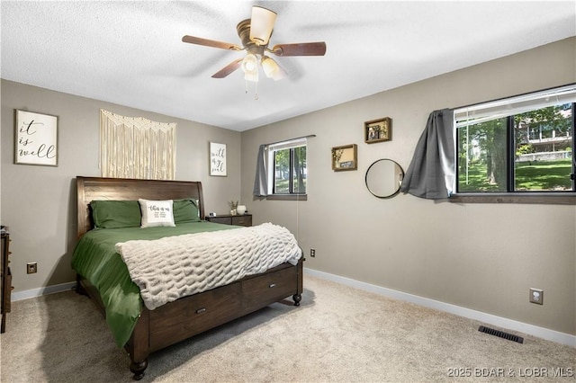4741 Clearwood Ln, Osage Beach, MO 65065 - carpeted bedroom featuring baseboards and a ceiling fan