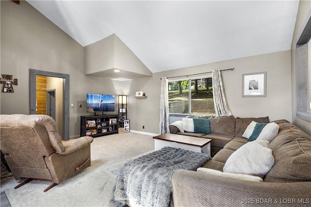 4741 Clearwood Ln, Osage Beach, MO 65065 - carpeted living room featuring high vaulted ceiling and baseboards
