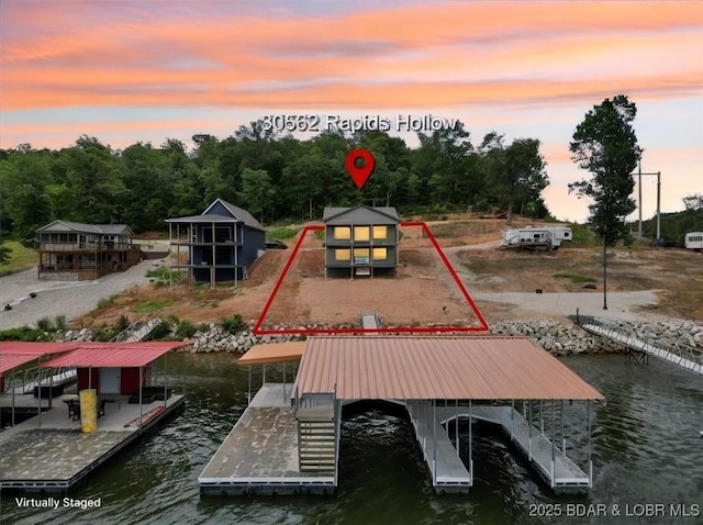30586 Rapids Holw, Stover, MO 65037 - dock area featuring a water view and boat lift