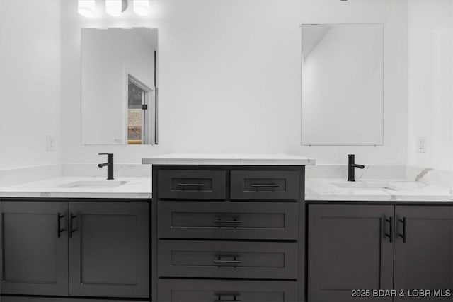 30586 Rapids Holw, Stover, MO 65037 - bathroom featuring two vanities