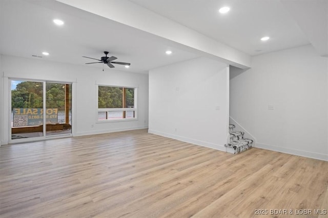 30586 Rapids Holw, Stover, MO 65037 - unfurnished living room with light wood-style flooring, recessed lighting, stairs, and ceiling fan