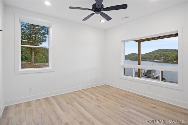 30586 Rapids Holw, Stover, MO 65037 - spare room featuring wood finished floors, recessed lighting, and ceiling fan