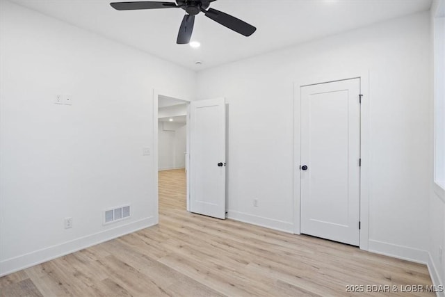 30586 Rapids Holw, Stover, MO 65037 - unfurnished bedroom featuring light wood-style floors and a ceiling fan