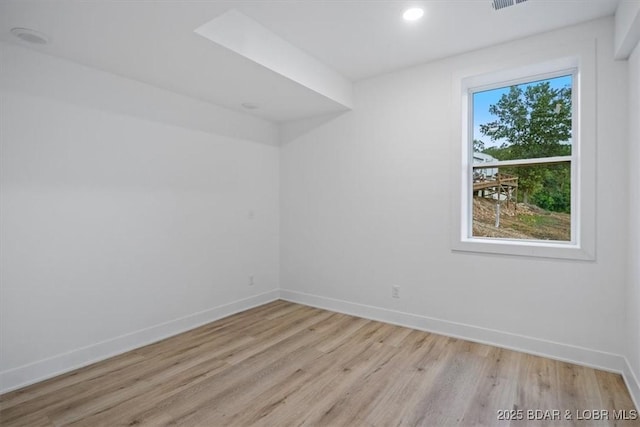 30586 Rapids Holw, Stover, MO 65037 - empty room featuring light wood finished floors and recessed lighting
