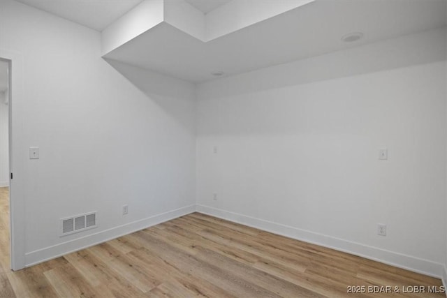 30586 Rapids Holw, Stover, MO 65037 - spare room with light wood-style floors and baseboards