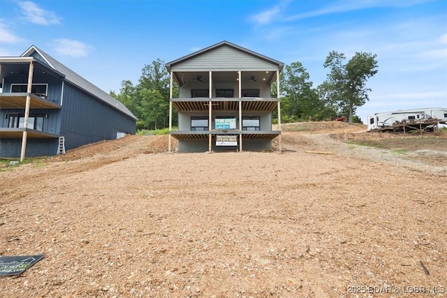 30586 Rapids Holw, Stover, MO 65037 - rear view of house with a ceiling fan