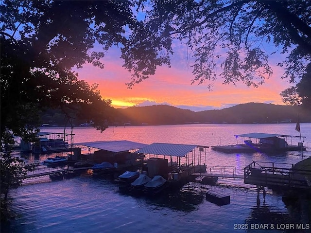 27086 Comanche Cv, Rocky Mount, MO 65072 - dock with a water and mountain view