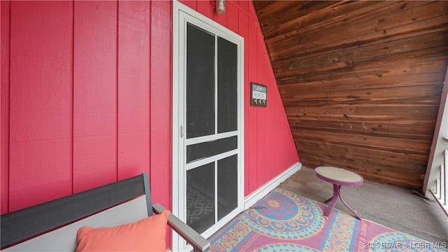 27086 Comanche Cv, Rocky Mount, MO 65072 - view of exterior entry featuring board and batten siding