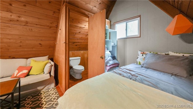 27086 Comanche Cv, Rocky Mount, MO 65072 - bedroom with wood walls, lofted ceiling, and wood finished floors